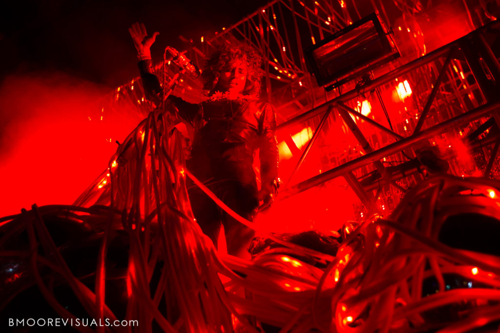 Wayne Coyne of The Flaming Lips performs in an onslaught of red light at Gasparilla Music Festival in Tampa, Florida