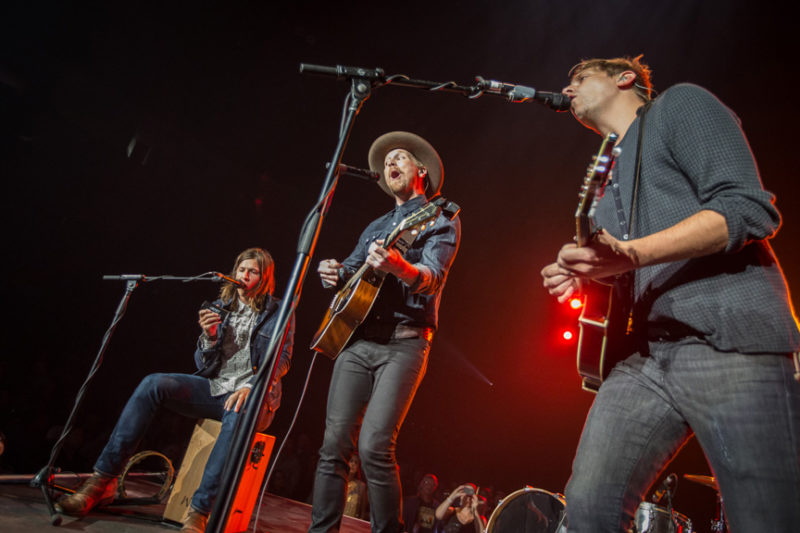 Seth Bolt, Bear Rinehart, and Bo Rinehart of Needtobreathe perform during the Third Day and Friends concert at Infinite Energy Center in Atlanta, Georgia