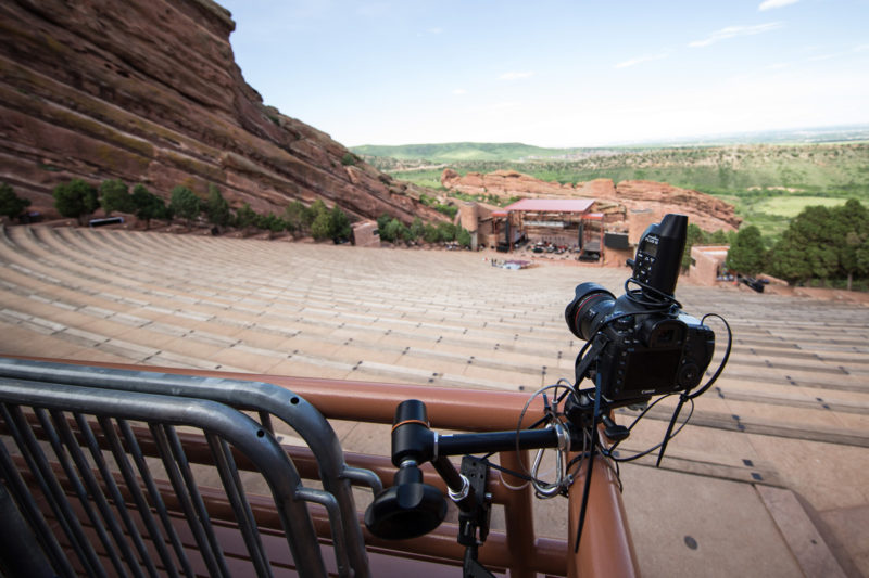 Canon 5D Mark III with 8-15mm fisheye lens and PocketWizard Plus III set up as a remote camera on a Manfrotto variable friction Magic Arm at the back corner of Red Rocks Amphitheater in Morrison, Colorado