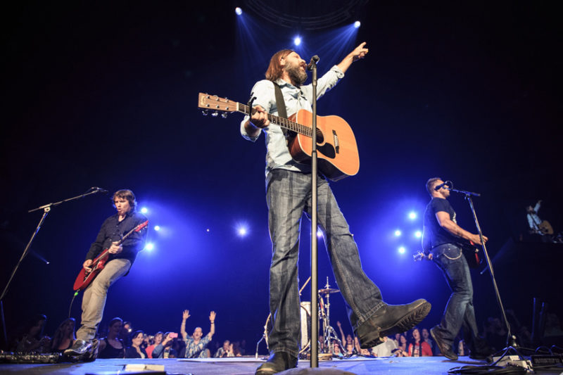 Mark Lee, Mac Powell, and Tai Anderson of Third Day during the Third Day and Friends concert at Infinite Energy Center in Atlanta, Georgia