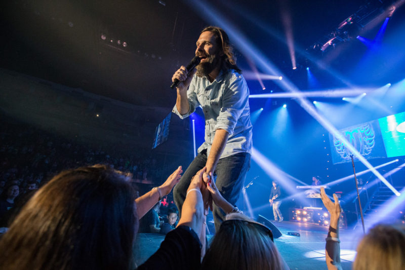 Mac Powell of Third Day greets fans during the Third Day and Friends concert at Infinite Energy Center in Atlanta, Georgia