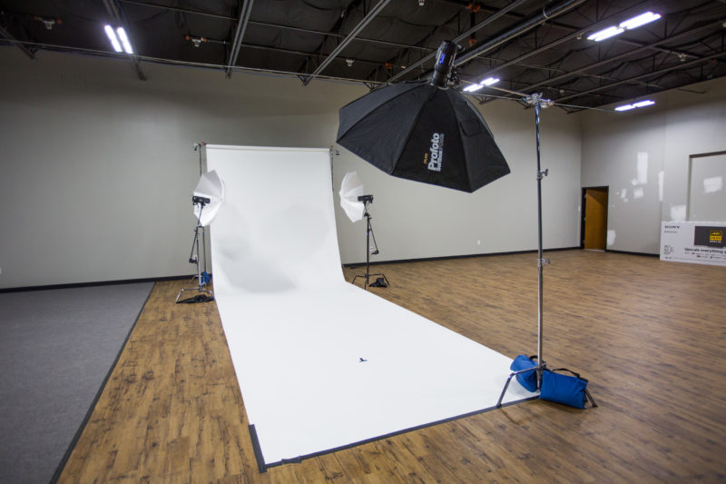 Seamless paper background and studio lights set up for Dude Perfect photo shoot