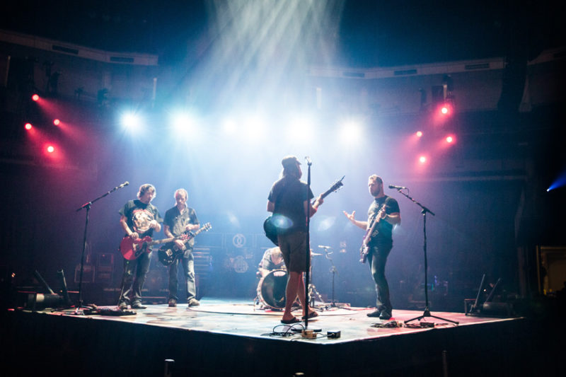 Mark Lee, Mac Powell, and Tai Anderson of Third Day soundcheck at Infinite Energy Center in Atlanta, Georgia